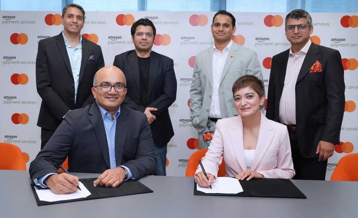 Photo 1 - Mastercard and Amazon Payment Services executives at the signing ceremony (Photo AETOSWire)_1727687270.jpg_ssict_1200_732