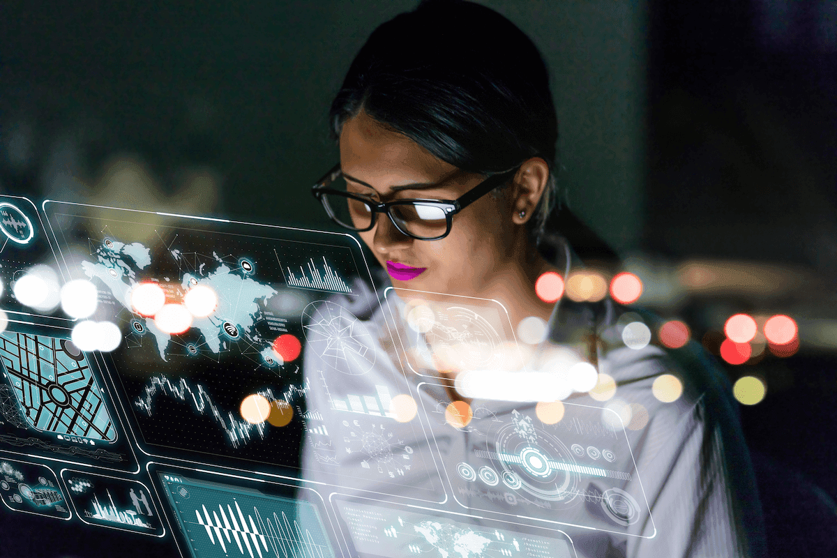 Female engineer looking at various information on screen_Metamorworks_GettyImages-847519080